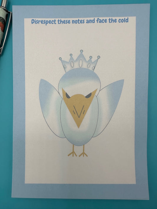 A notepad that has a bird character on it that is blue and white color with a yellow snout and black eyes and also has a crown on top of its head. The notepad edges has a light blue color with the heading on top of the notepad stating "Disrespect these notes and face the cold". 
